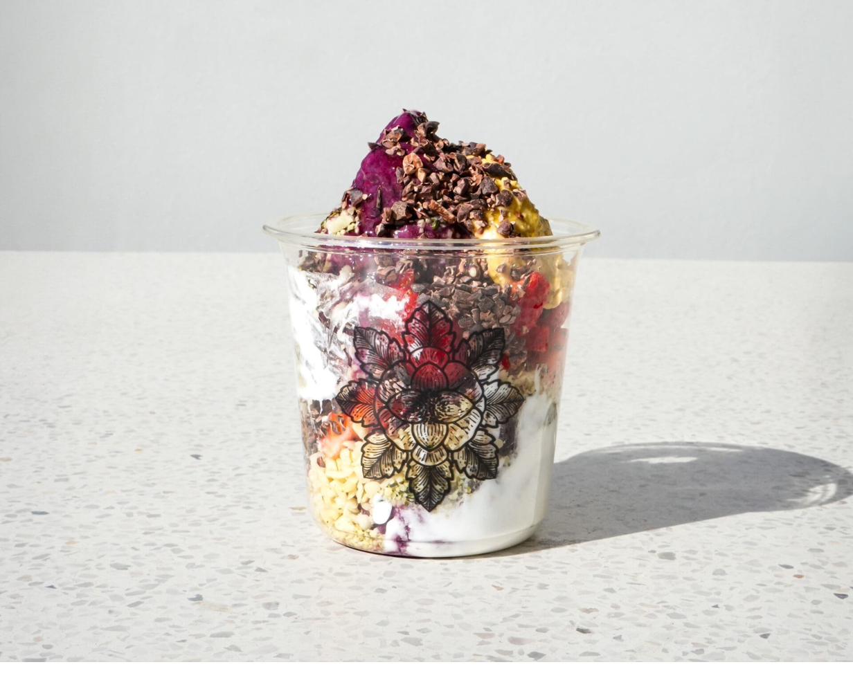 Be True Performance Bowl — dragon fruit, berries, cacao nibs and coconut yogurt in a lotus-print cup